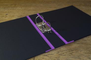 black folder open with lever mechanism and reinforced linen edges, lilac